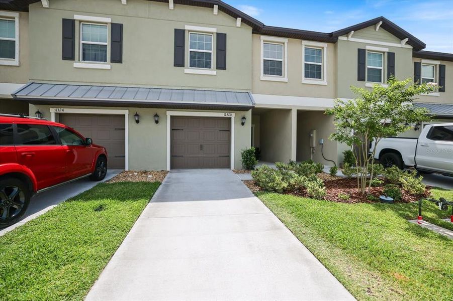 Front exterior of a new home in , Palmetto, FL, highlighting curb appeal (Image 23).