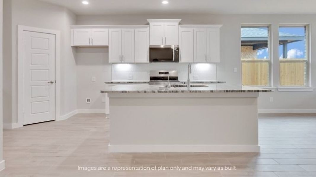 Representative furnished interior of a home built from the Portales by D.R. Horton in Homestead at Parks Bell Ranch, Odessa (Image 5).
