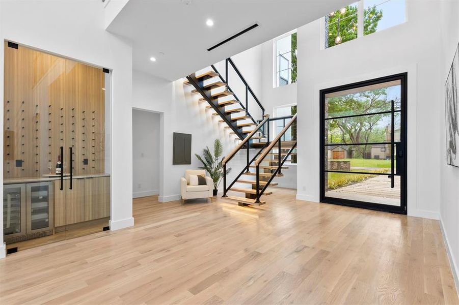 Entry Showing sensor-lighted Staircase!