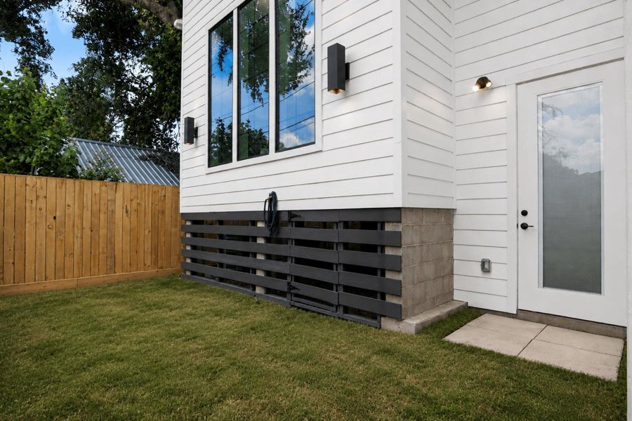 Exterior details and patio area of a home in , Houston (Image 4). Exterior details and patio area of a home in , Houston (Image 4).