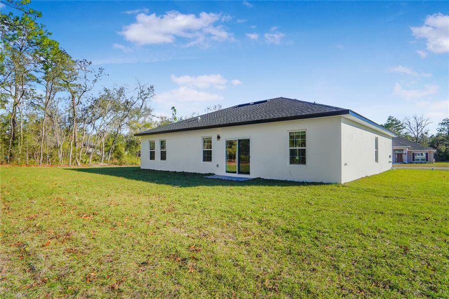 Exterior details and patio area of a home in , Citrus Springs (Image 4).