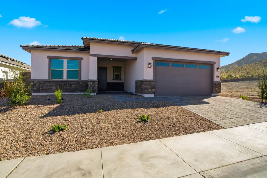 Front exterior of a new home in Sanctuary, Phoenix, AZ, highlighting curb appeal (Image 1). Front exterior of a new home in Sanctuary, Phoenix, AZ, highlighting curb appeal (Image 1).