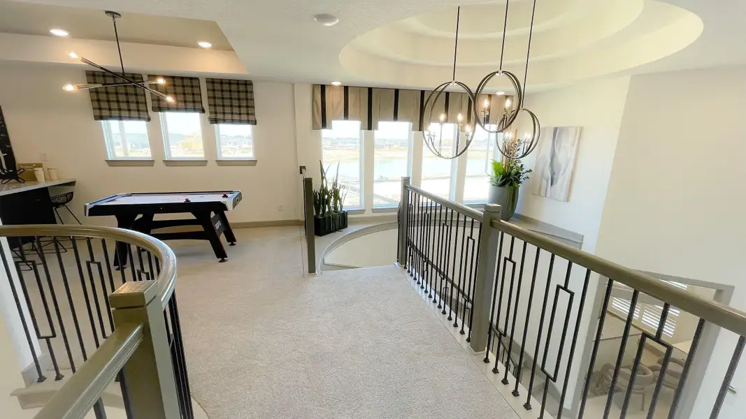 Furnished interior view inside a new home in Sunterra, Katy (Image 5).