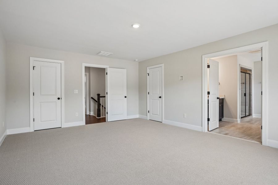 Representative unfurnished interior of a home built from the Fontana by Caruso Homes in Blue Run, Raleigh (Image 30).