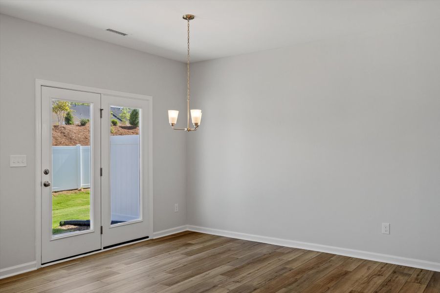 Spacious, unfurnished interior of a new home in Sweetbrier, Durham (Image 17).