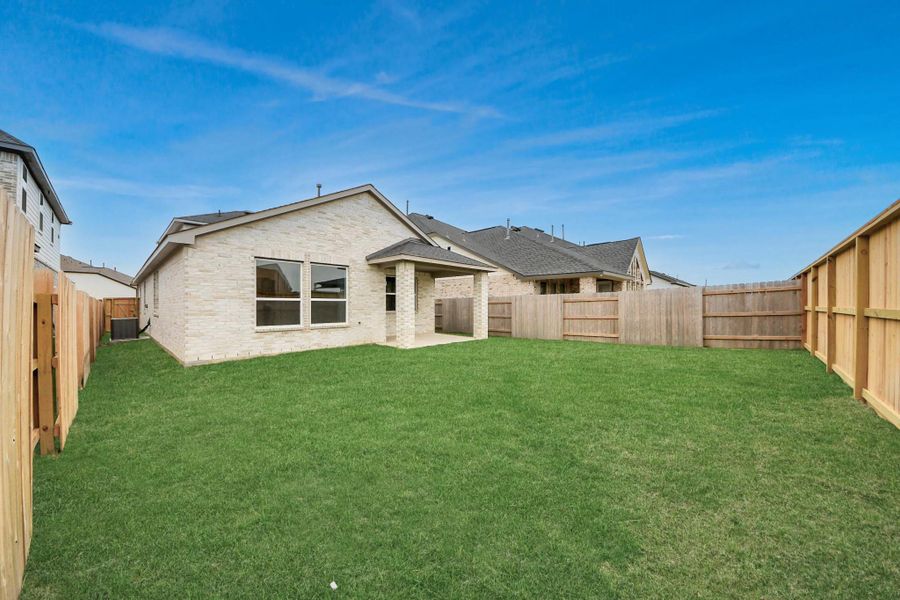 Exterior details and patio area of a home in Elyson, Katy (Image 29).