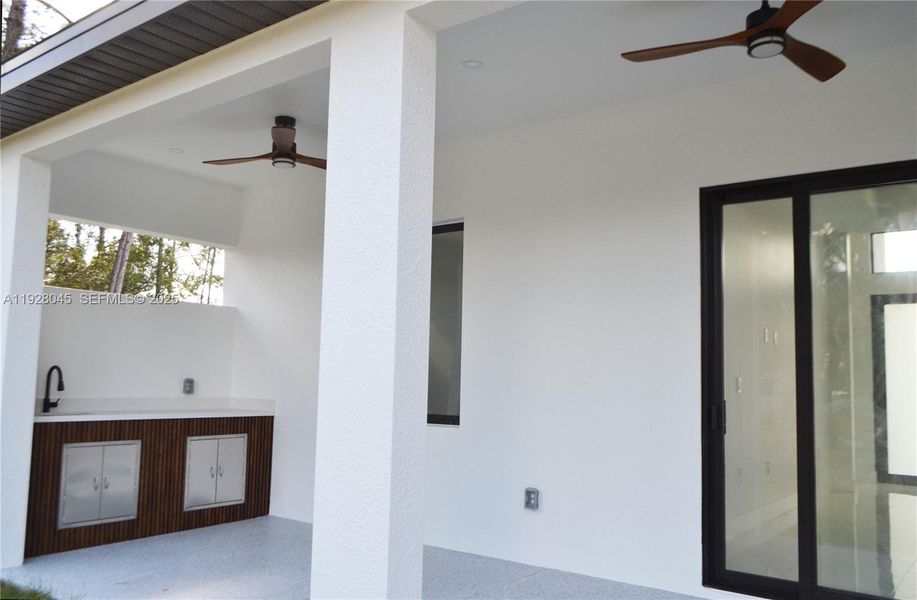 Exterior details and patio area of a home in , Lehigh Acres (Image 12).