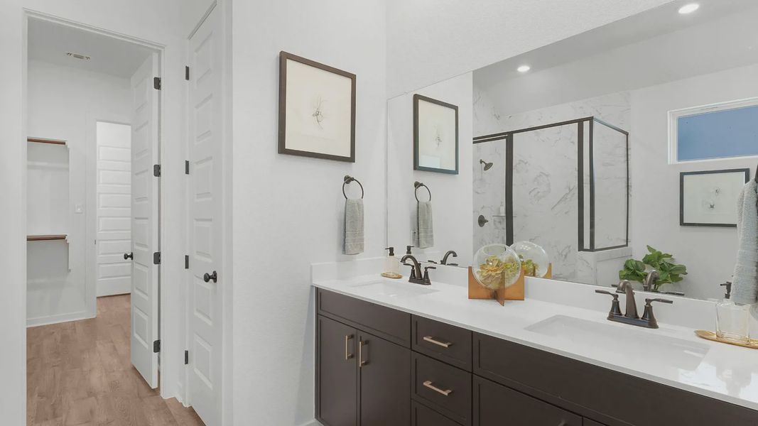 Representative furnished interior of a home built from the Brooks by Chesmar Homes in University Heights, Round Rock (Image 18).