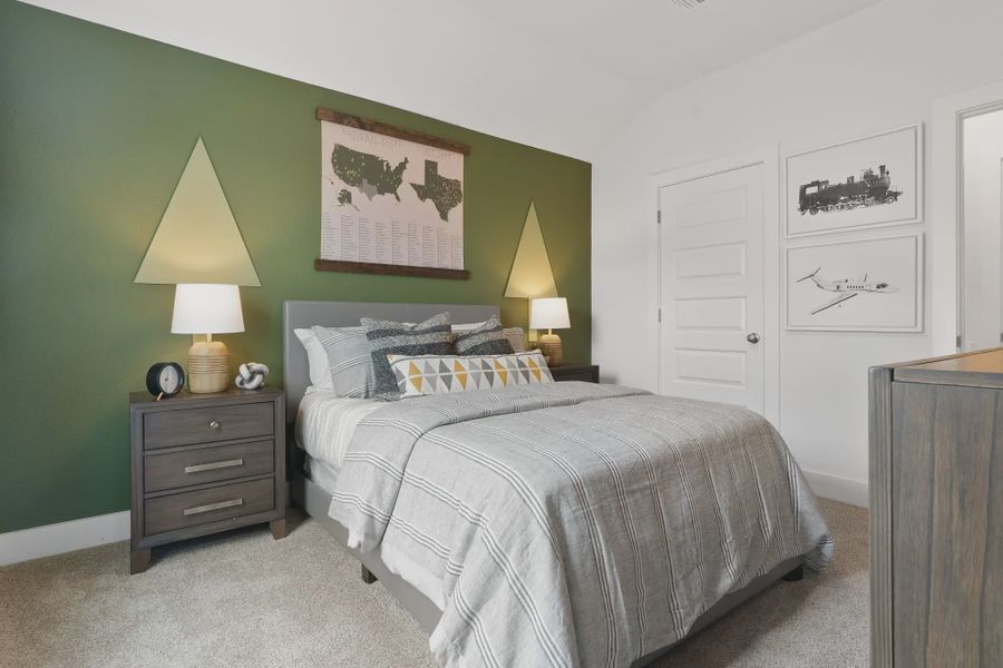 Representative furnished interior of a home built from the Madison by Chesmar Homes in Lakes of Cane Island, Katy (Image 16).