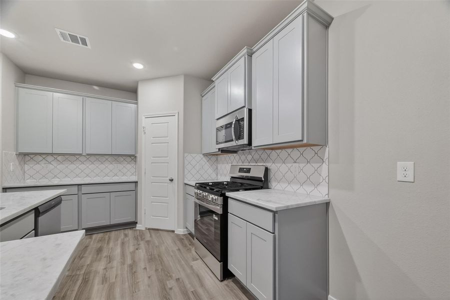 Furnished interior view inside a new home in Rollingbrook Estates, Baytown (Image 7).