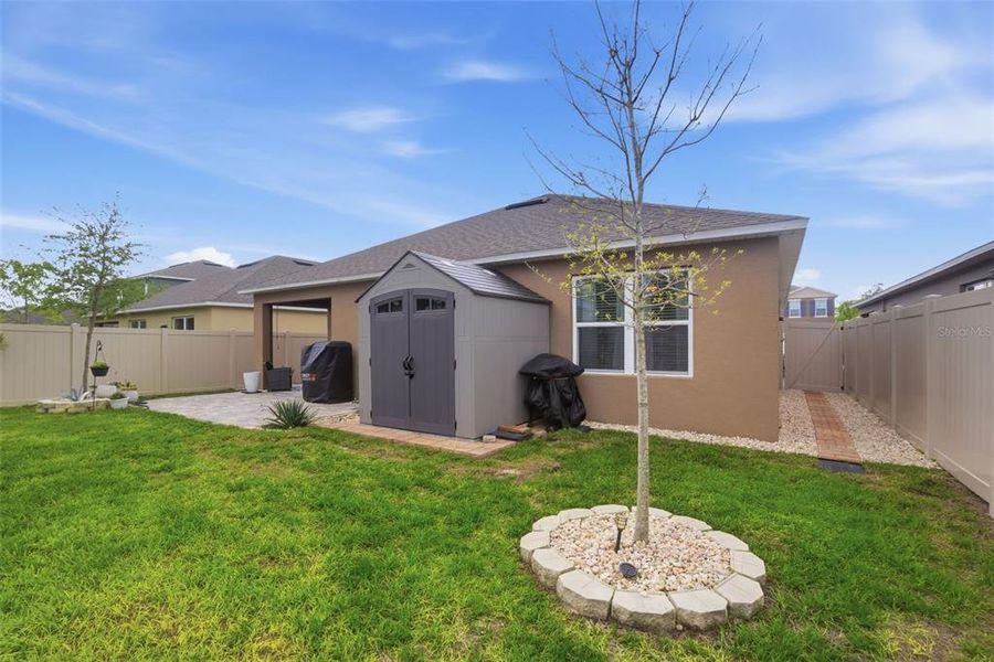 Exterior details and patio area of a home in Cadence at Parc Hill, Orange City (Image 26).