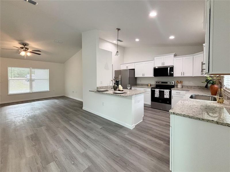 Furnished interior view inside a new home in , Dunnellon (Image 12).