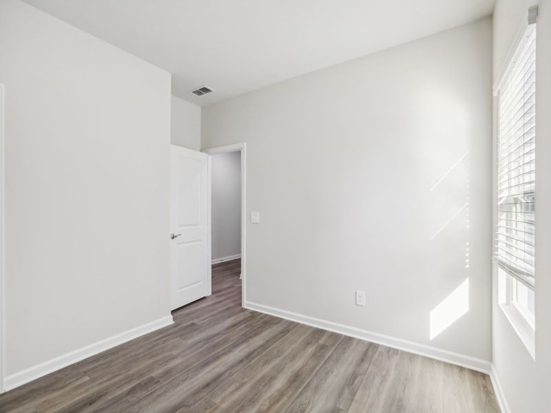 Secondary bedroom in the Chandler floorplan at 253 White Birch Lane in Angier, NC.