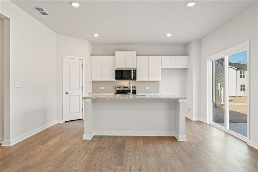 Furnished interior view inside a new home in Belleview Manor, Fairburn (Image 12).