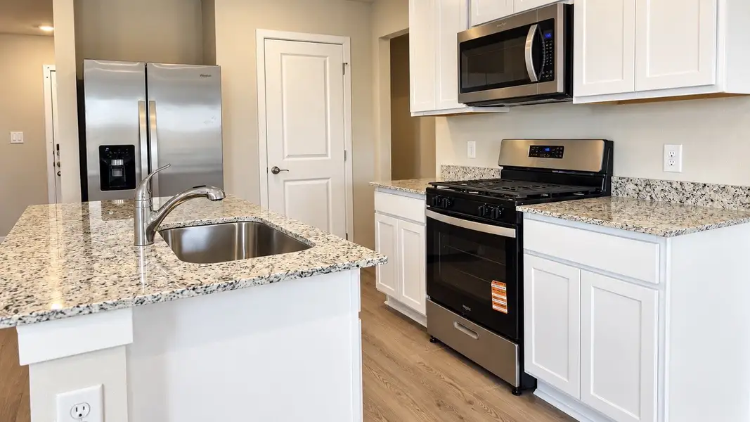 Furnished interior view inside a new home in Waldron Estates, Corpus Christi (Image 3).
