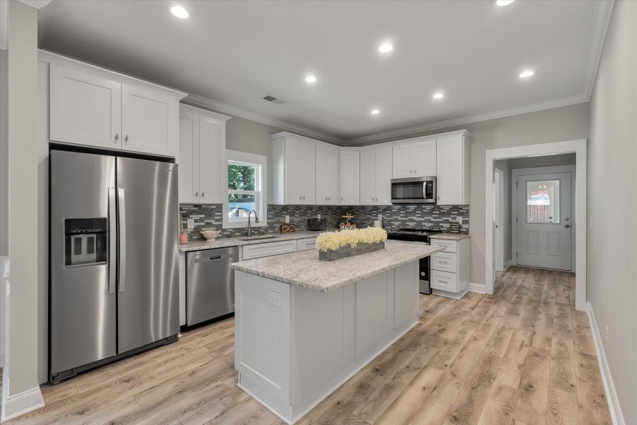 Furnished interior view inside a new home in , North Charleston (Image 12).