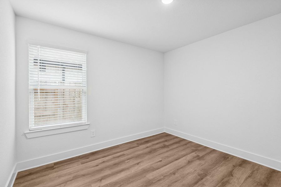 Spacious, unfurnished interior of a new home in Sorella, Tomball (Image 17).