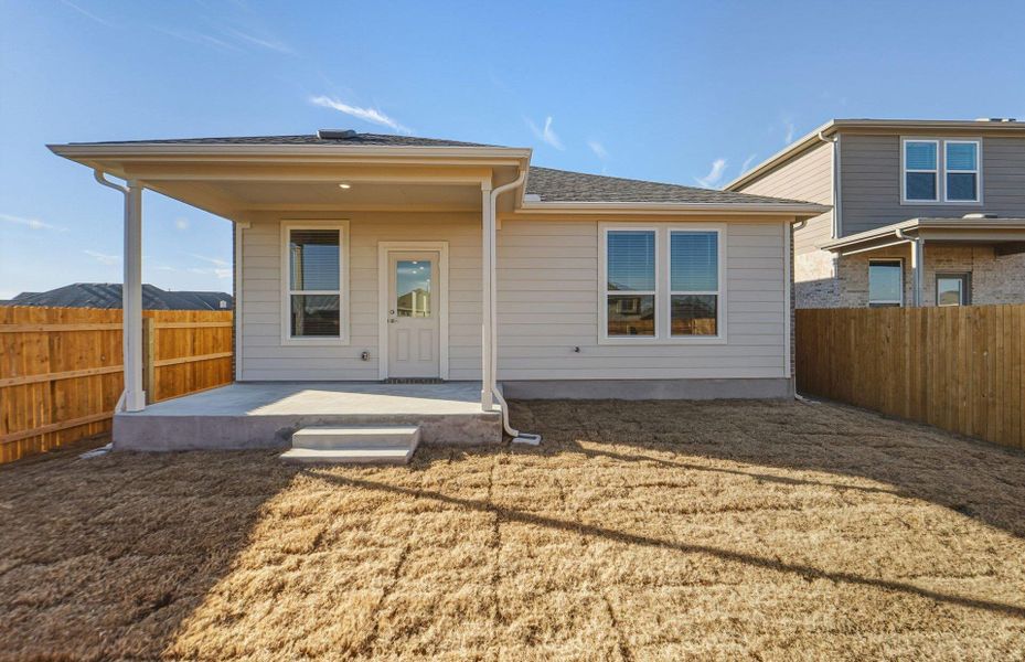 Exterior details and patio area of a home in Crosswinds, Kyle (Image 4).