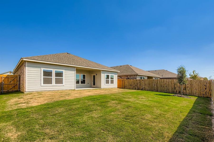 Exterior details and patio area of a home in Sperling Farms, Ferris (Image 2). Exterior details and patio area of a home in Sperling Farms, Ferris (Image 2).