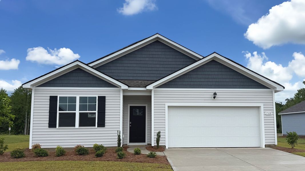 Front exterior of a new home in Meadow Walk, Loris, SC, highlighting curb appeal (Image 1).