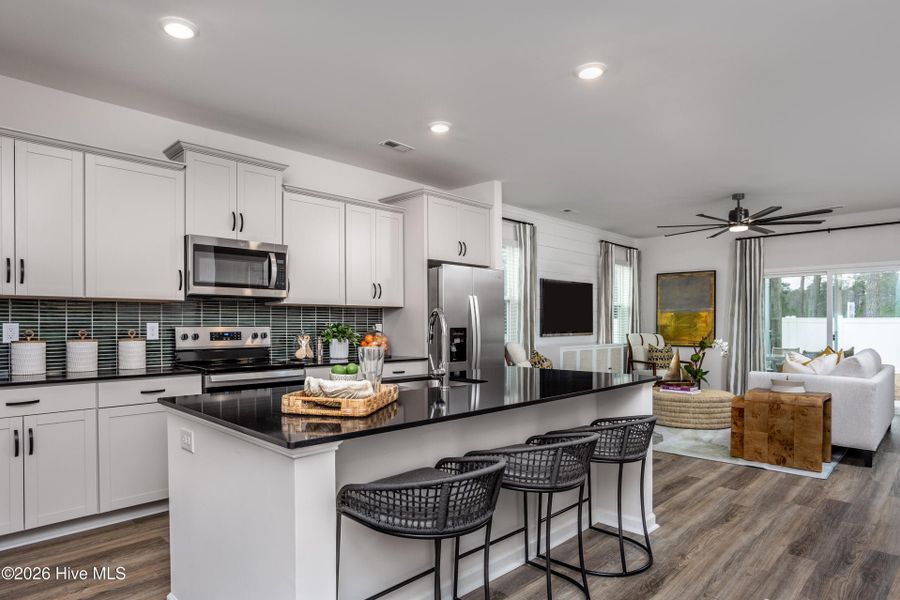 Furnished interior view inside a new home in Coastal Haven Townes, Leland (Image 16).