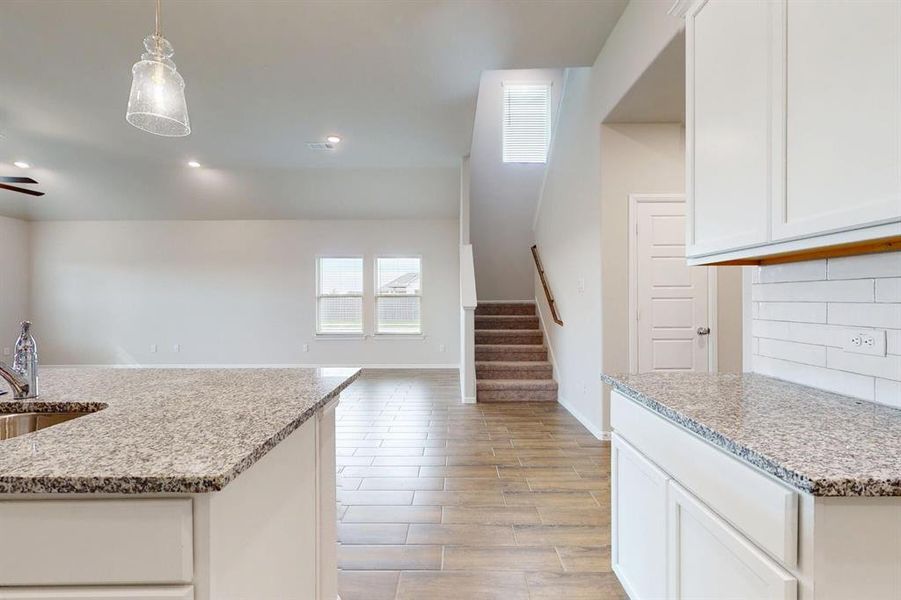 Furnished interior view inside a new home in Prairie Ridge at Goodland, Venus (Image 7).