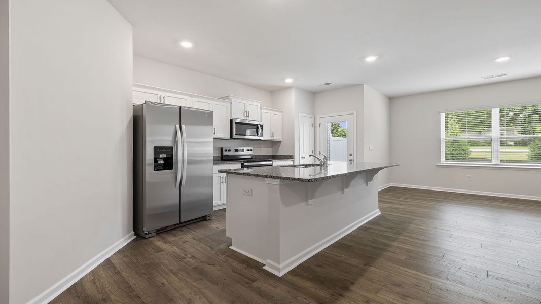 Furnished interior view inside a new home in Tanglewood Townes, Greenville (Image 7).
