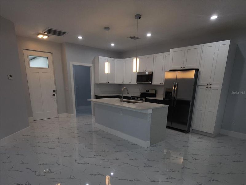 Furnished interior view inside a new home in , Port Charlotte (Image 6).