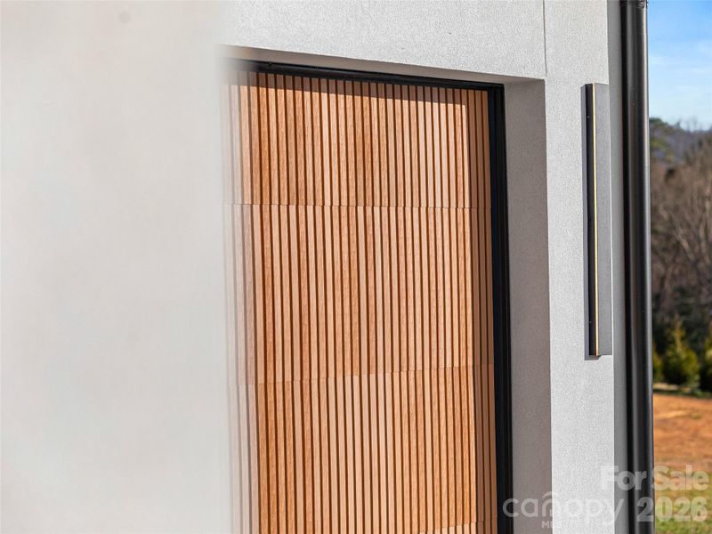 Exterior details and patio area of a home in , Fletcher (Image 3).