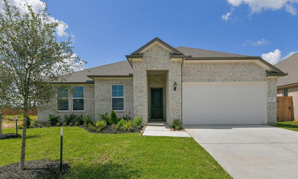 Front exterior of a new home in , Texas City, TX, highlighting curb appeal (Image 18).