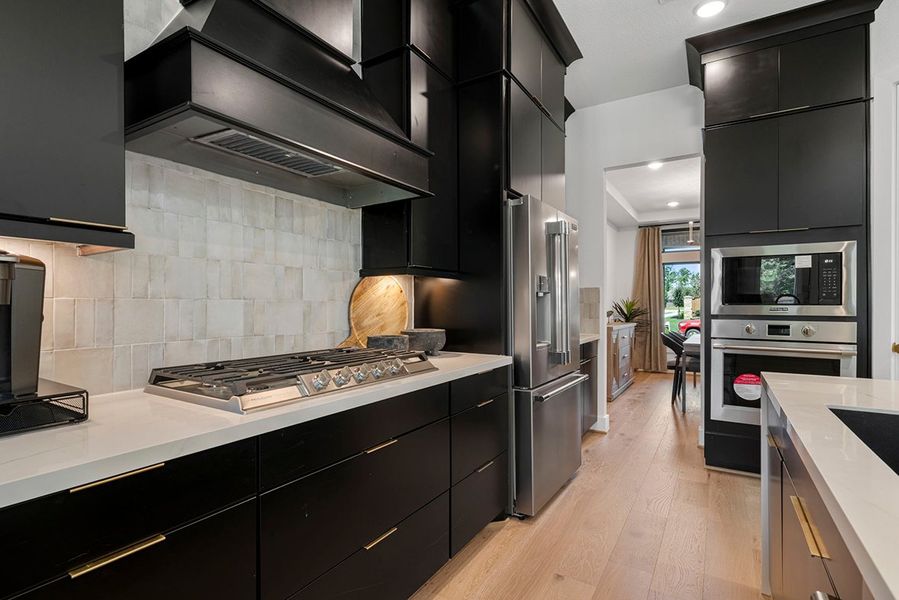 Furnished interior view inside a new home in The Highlands 50', Porter (Image 15).