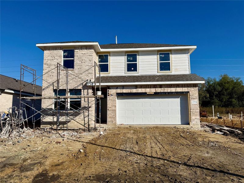 Two story home with 5 beds, 3 baths, and 2 car garage