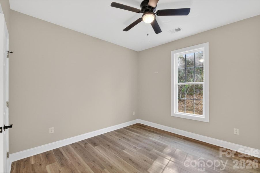 Spacious, unfurnished interior of a new home in , Lenoir (Image 35).