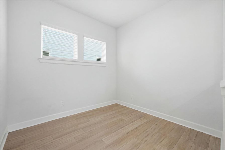 Spacious, unfurnished interior of a new home in The Groves 35', Humble (Image 30).