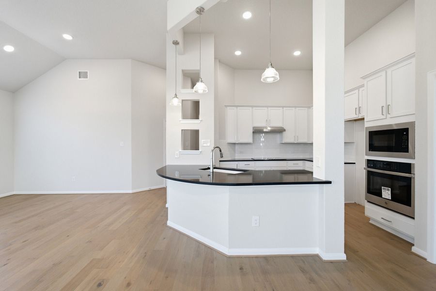 Furnished interior view inside a new home in The Woodlands at Medina Hills, Mico (Image 6).