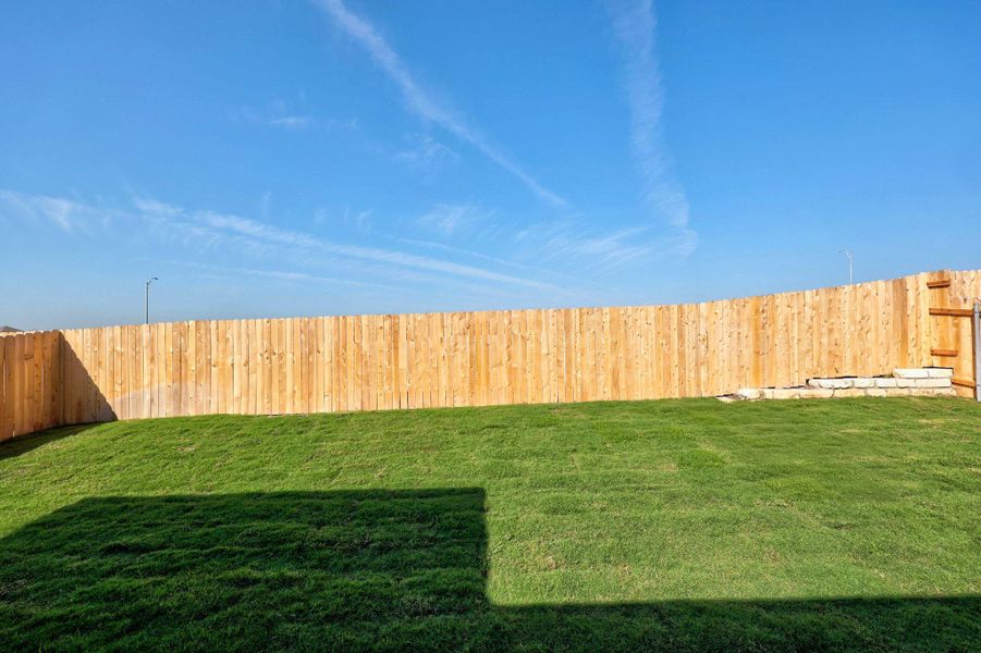 Front exterior of a new home in Salerno - Classic Collection, Round Rock, TX, highlighting curb appeal (Image 16). Front exterior of a new home in Salerno - Classic Collection, Round Rock, TX, highlighting curb appeal (Image 16).