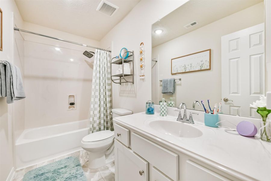 Furnished interior view inside a new home in , League City (Image 14).