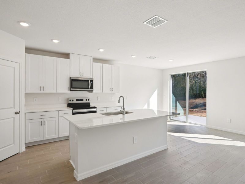 Furnished interior view inside a new home in Leyland Preserve - Classic Series, Brooksville (Image 5).