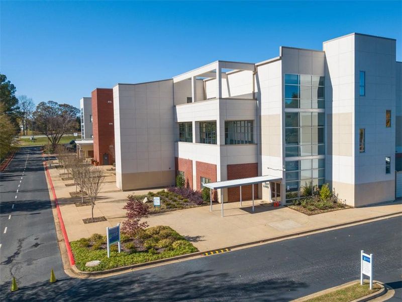Condo located in Flowery Branch, GA showcasing its design and architecture (Image 2). Condo located in Flowery Branch, GA showcasing its design and architecture (Image 2).