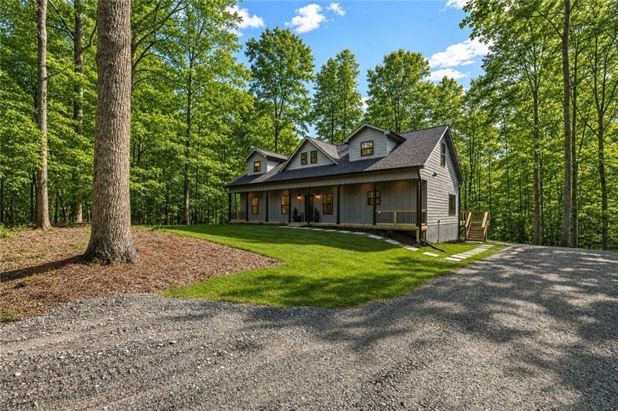 Front exterior of a new home in , Ellijay, GA, highlighting curb appeal (Image 1). Front exterior of a new home in , Ellijay, GA, highlighting curb appeal (Image 1).