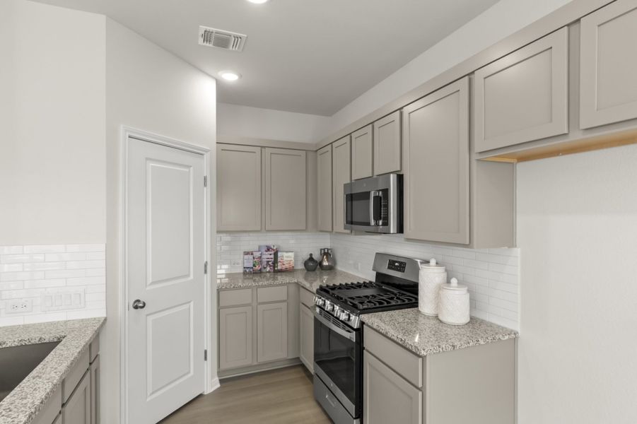 Furnished interior view inside a new home in Blanco Vista, San Marcos (Image 14).
