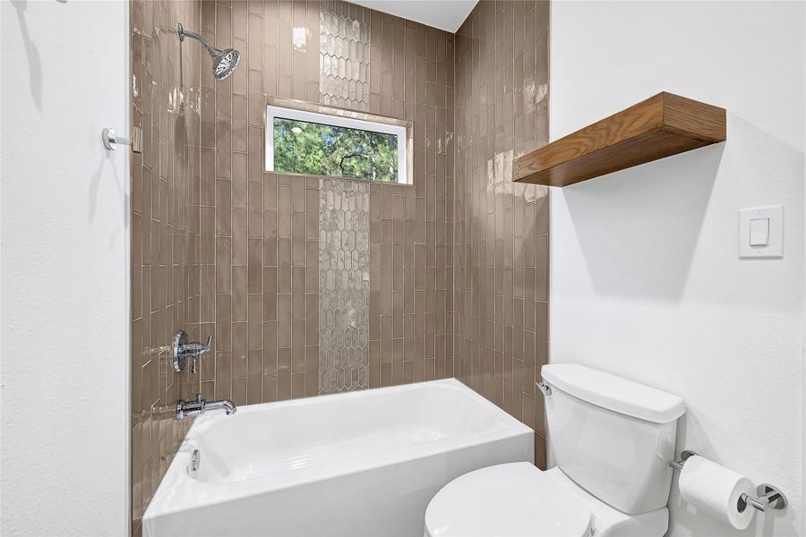 Hollywood bathroom with custom tile