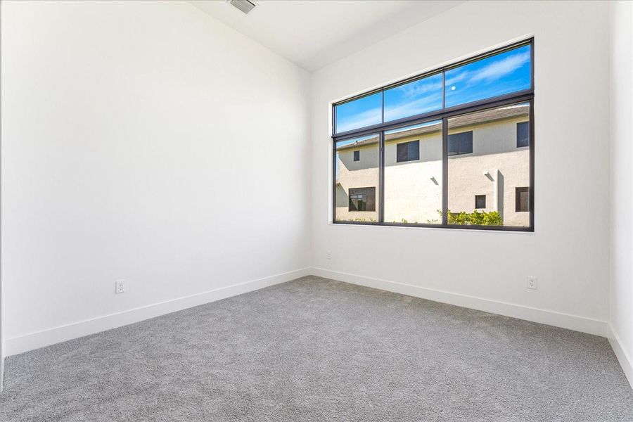 Bedroom with walk in closet