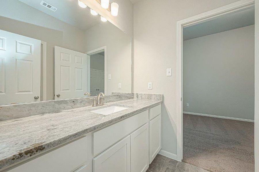 Furnished interior view inside a new home in Grand Magnolia, Magnolia (Image 5).