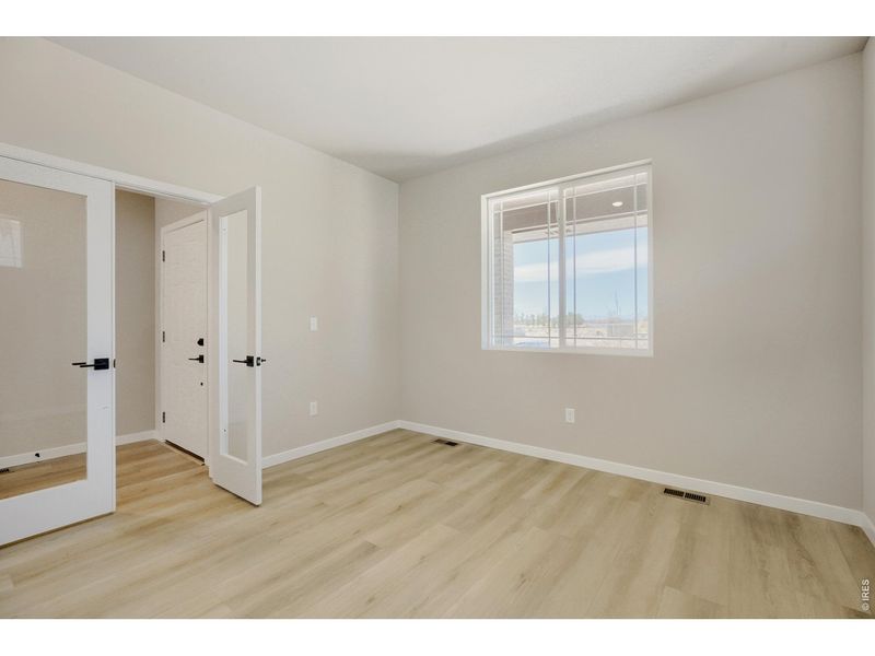 Spacious, unfurnished interior of a new home in Farmstead, Berthoud (Image 32).