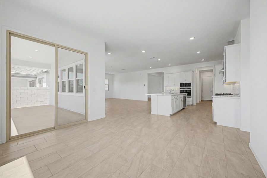 Spacious, unfurnished interior of a new home in Empire Pointe, Queen Creek (Image 8).