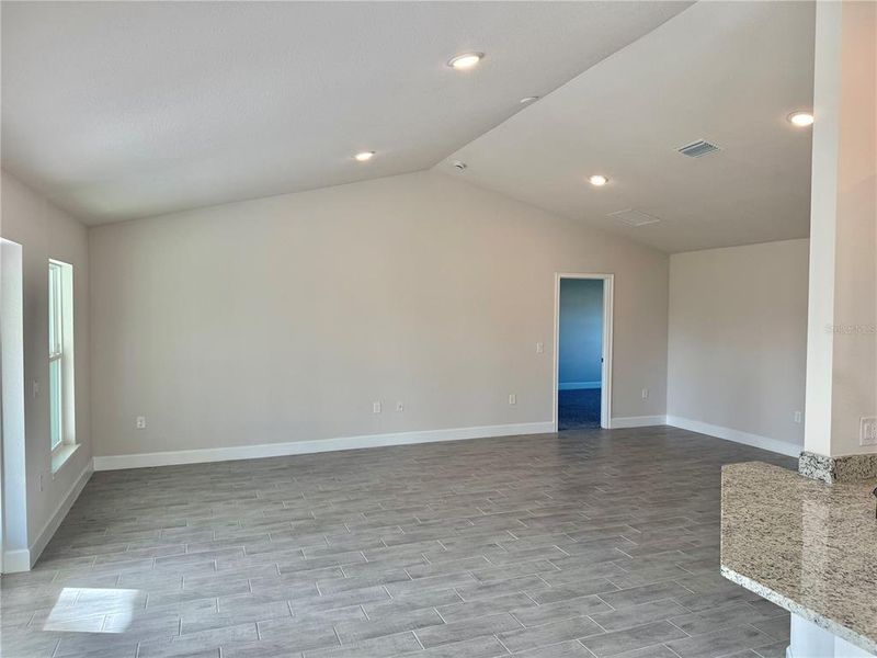 Spacious, unfurnished interior of a new home in , Port Charlotte (Image 26).