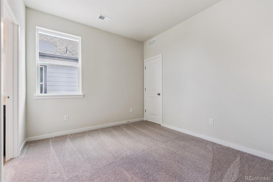 Spacious, unfurnished interior of a new home in Floret Collection at Parkdale Commons, Lafayette (Image 15).