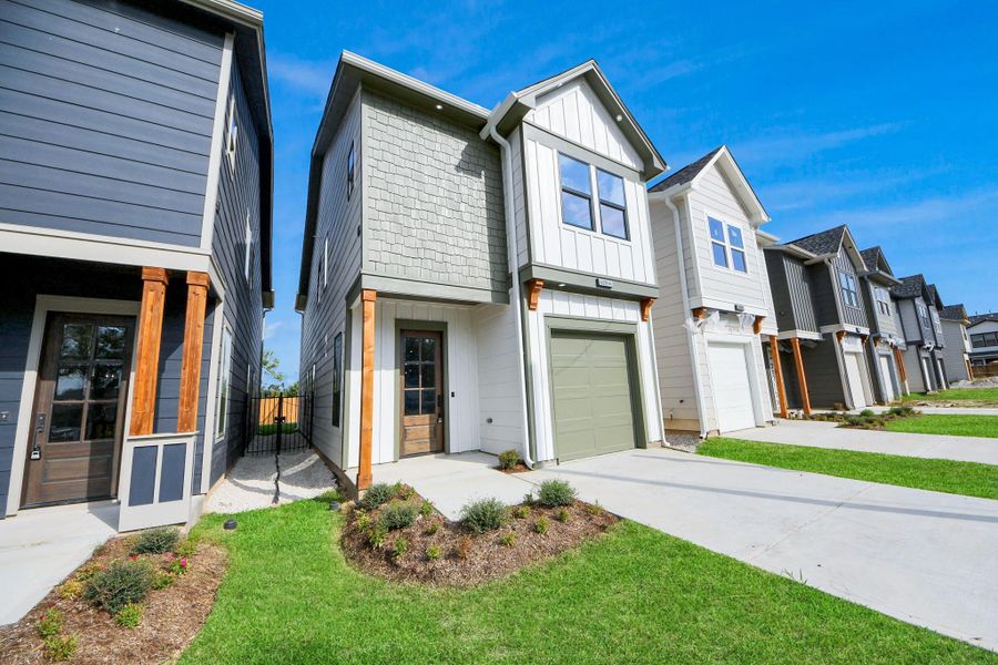 Front exterior of a new home in , Houston, TX, highlighting curb appeal (Image 28).