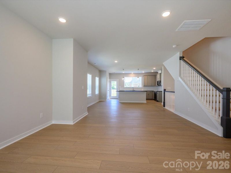 Spacious, unfurnished interior of a new home in Central Living at Craig, Charlotte (Image 11).